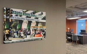 Photo featuring the newly remodeled leasing office, detail of MN State Fair Artwork