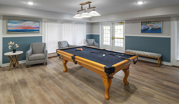 Photo of Falcon Heights apartment community room with a pool table.